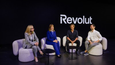 Revolut headquarters grand opening, showcasing modern architecture and bustling activity at the launch event.