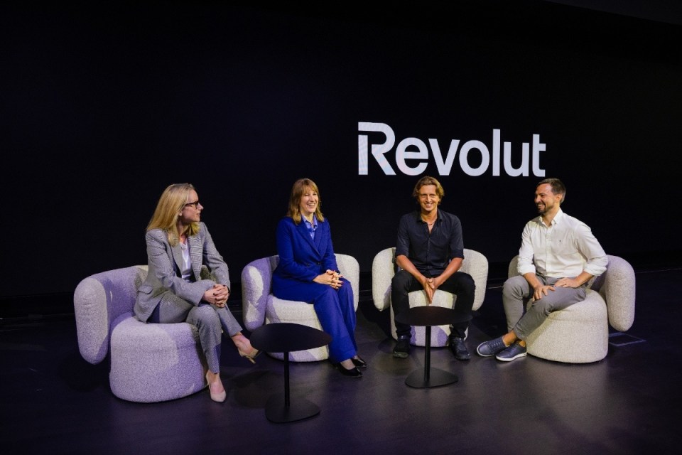 Revolut headquarters grand opening, showcasing modern architecture and bustling activity at the launch event.