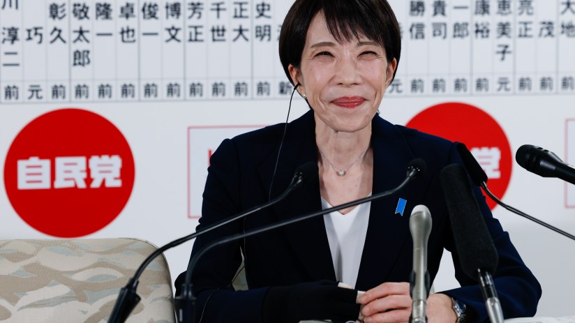 Sanae Takaichi speaking at a press conference, addressing recent political developments in Japans government policies