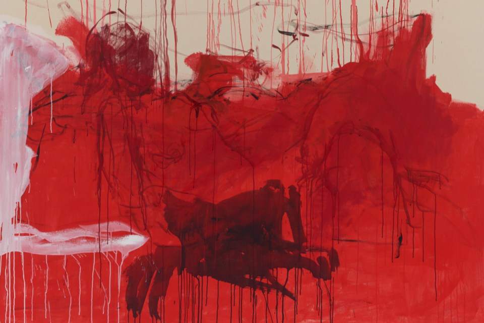 Tracey Emin showcasing her artwork in a gallery setting, highlighting contemporary art themes and personal expression