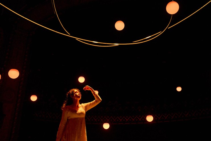 Arcadia cityscape featuring modern architecture and urban skyline under clear blue sky, highlighting bustling city life