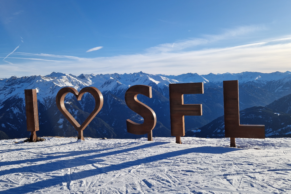 Breaking news event in progress with gathered reporters and onlookers capturing the scene in a bustling city environment