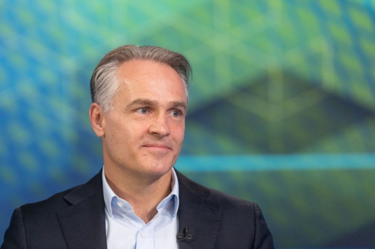 Kurt Bjorklund of Permira in a corporate setting, emphasizing leadership and expertise in global investment strategies.