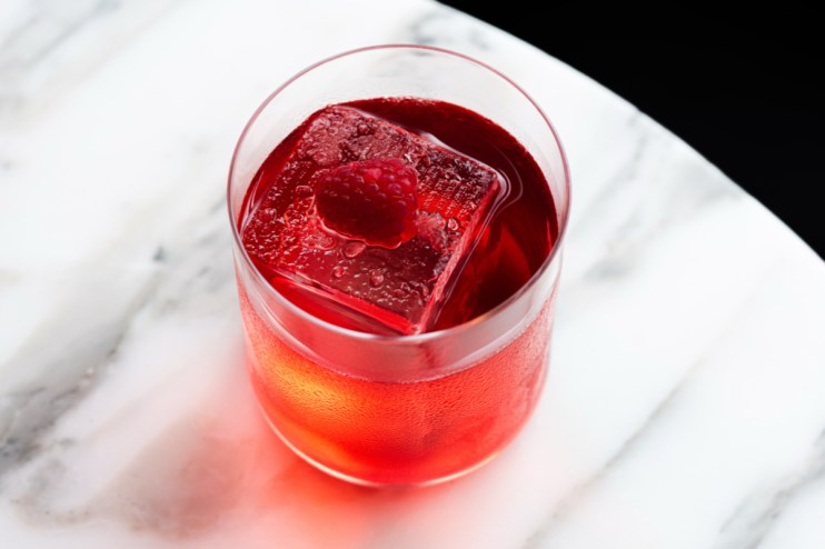 Three sheets of paper stacked neatly on a table, symbolizing organization and productivity in a professional setting.