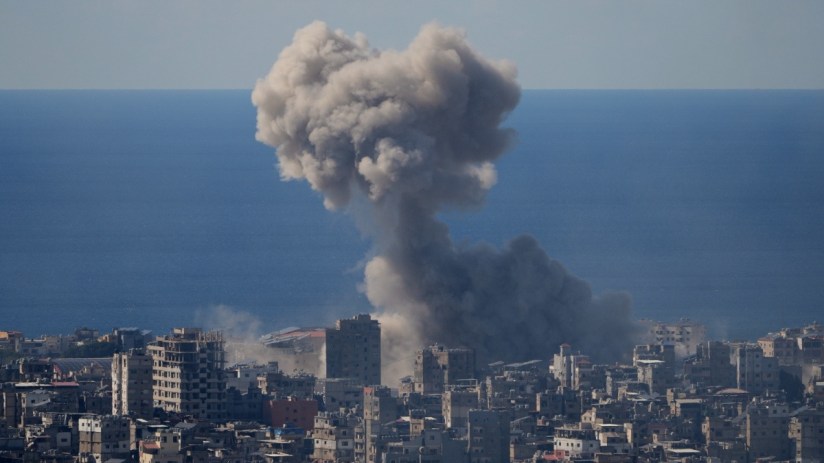 Breaking news concept with a journalist typing on a laptop, surrounded by newspapers and digital media elements