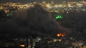News article illustration on a general topic, featuring a stock market graph and business professionals in a meeting.