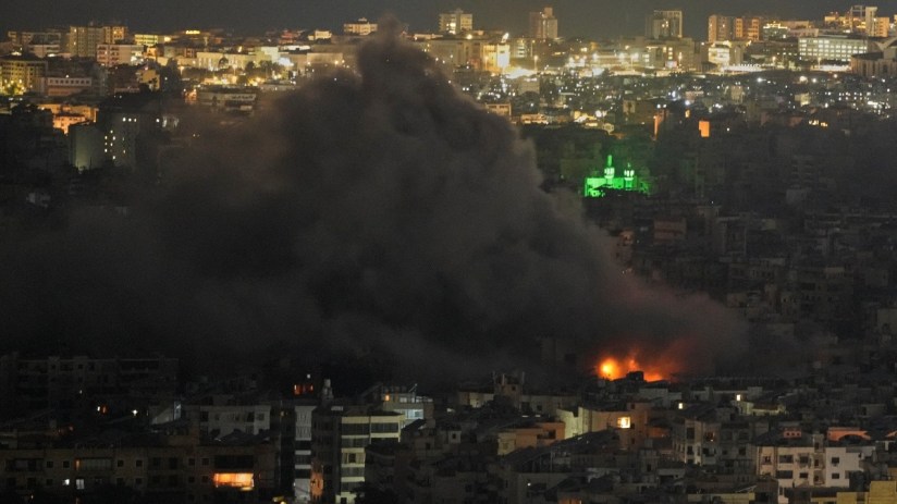 News article illustration on a general topic, featuring a stock market graph and business professionals in a meeting.