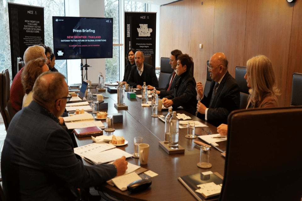 TCEB event in urban setting showcasing business collaboration and innovation amidst cityscape backdrop