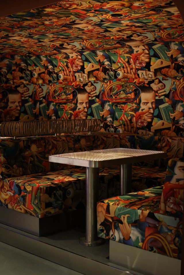 Booth setup showcasing innovative technology solutions at a business expo, featuring interactive displays and industry exp...