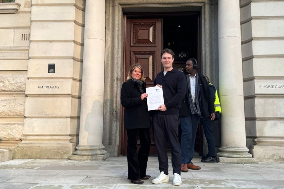 Chancellor delivering a speech at a press conference, addressing economic policies and fiscal strategies for the upcoming ...