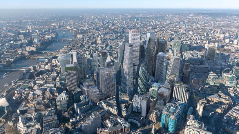 City skyline cluster viewed from the east at dusk, February 2026; showcasing urban development and architectural design