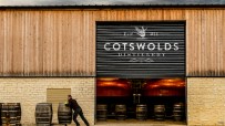 Cotswolds distillery exterior showcasing modern architecture in 2023, nestled in picturesque countryside setting