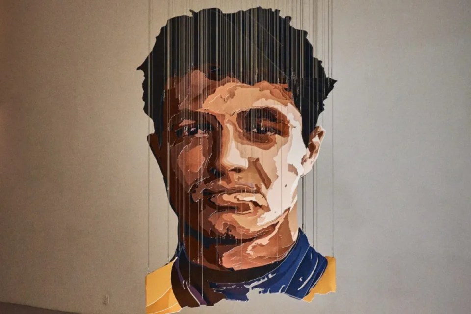 Cityscape with modern skyscrapers under a clear blue sky, highlighting urban development and architectural innovation.