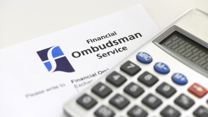 GettyImages 1367855662 shows a dynamic news scene with reporters, cameras, and microphones capturing a live business event.