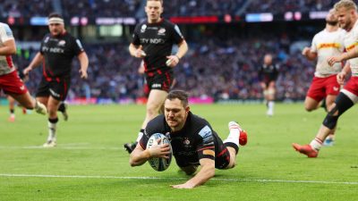 GettyImages 2107068629 depicts a professional business meeting in a modern office setting with diverse team members collab...