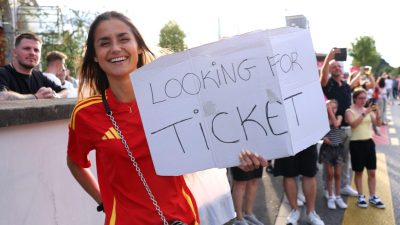 GettyImages 2226685810 depicts a significant event in a business setting, capturing professionals engaged in a dynamic mee...