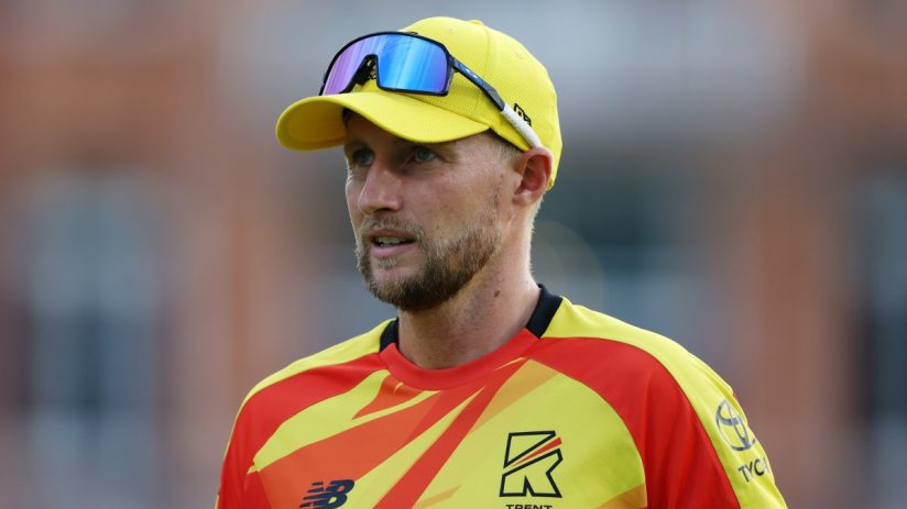 Breaking news scene with reporters and photographers capturing an event, showcasing media presence and public interest.