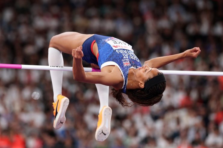 GettyImages 2236538372 showing a significant business event with diverse professionals engaged in discussion at a conferen...