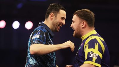 Getty Images logo on modern office building facade, reflecting urban skyline, emphasizing brands global media influence an...