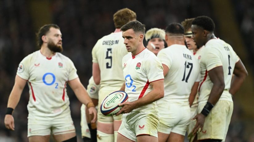 Getty Images logo on a smartphone screen against a backdrop of digital stock photos, symbolizing media and photography ind...