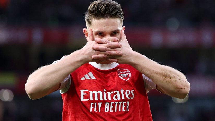 Dynamic cityscape with modern skyscrapers under a clear blue sky, highlighting urban development and economic growth