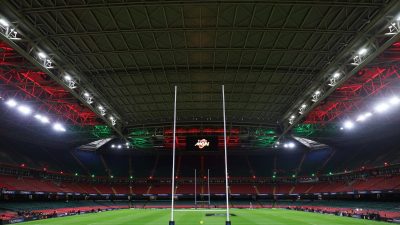 Breaking news coverage with journalists and photographers capturing a live press conference for a major business development