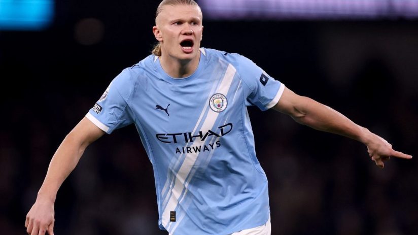 GettyImages 2264888572 shows a business meeting with diverse professionals discussing strategic planning in a modern offic...
