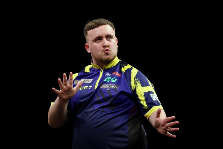Getty Images logo on a modern office building exterior against a clear blue sky, representing corporate branding and media...