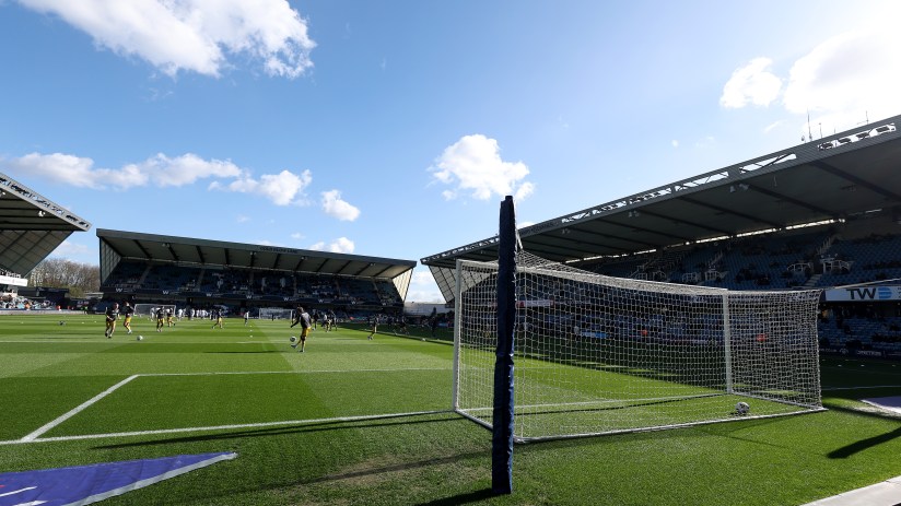 Business professionals engaged in a meeting discussing current market trends and strategies
