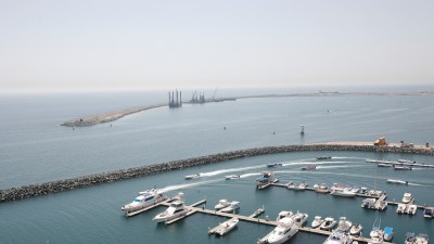 Breaking news concept with a digital globe and binary code, symbolizing global connectivity and information technology.