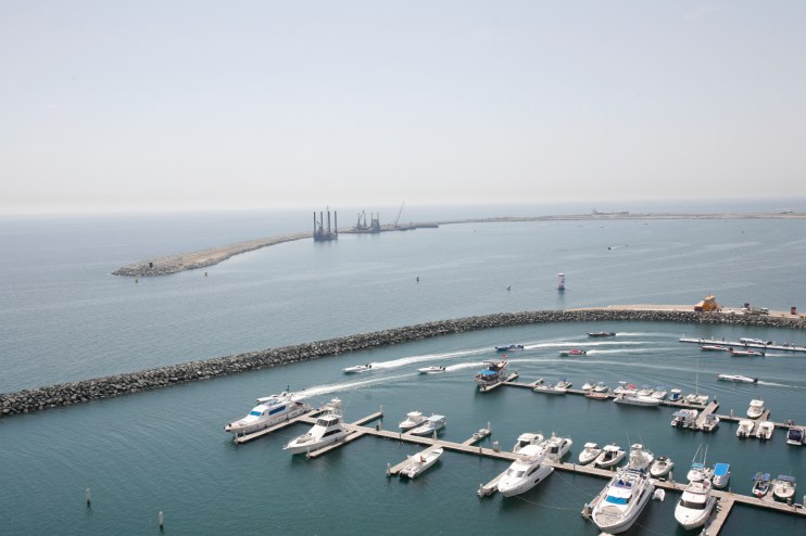 Breaking news concept with a digital globe and binary code, symbolizing global connectivity and information technology.