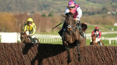 Vibrant Haitian street scene showcasing colorful buildings and bustling activity reflecting local culture and daily life.