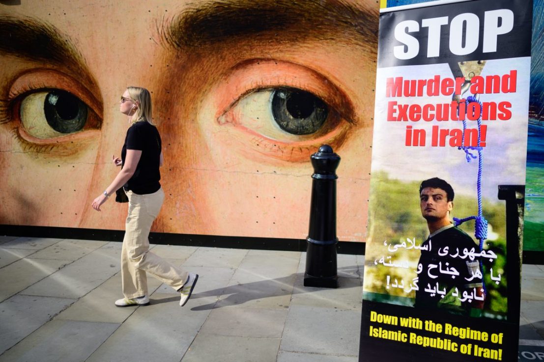 LONDON, ENGLAND - SEPTEMBER 16: Signs criticising the Iranian Islamic Regime's use of the death penalty are seen in Trafalgar Square on September 16, 2023 in London, England. Mahsa Amini, a 22-year-old Iranian woman died unexpectedly on September 16, 2022 in police custody after violating the Iranian Islamic Regime's imposed dress code for women, sparking mass protests and ensuing arrests and executions. Some 500 people were killed, including 70 children and thousands incarcerated during the protests that swept the nation. (Photo by Leon Neal/Getty Images)