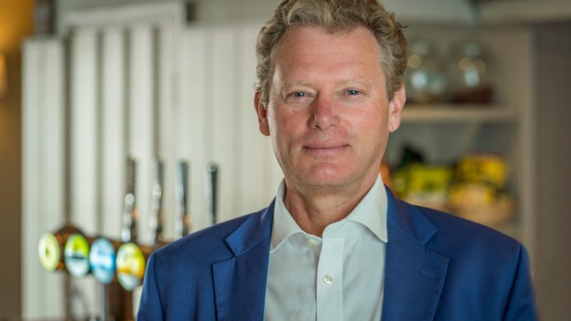 Jonathan Neame, Chief Executive of Shepherd Neame, discussing business strategies and company growth in a professional set...