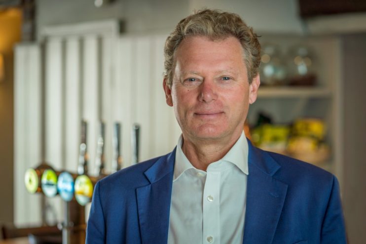 Jonathan Neame, Chief Executive of Shepherd Neame, discussing business strategies and company growth in a professional set...