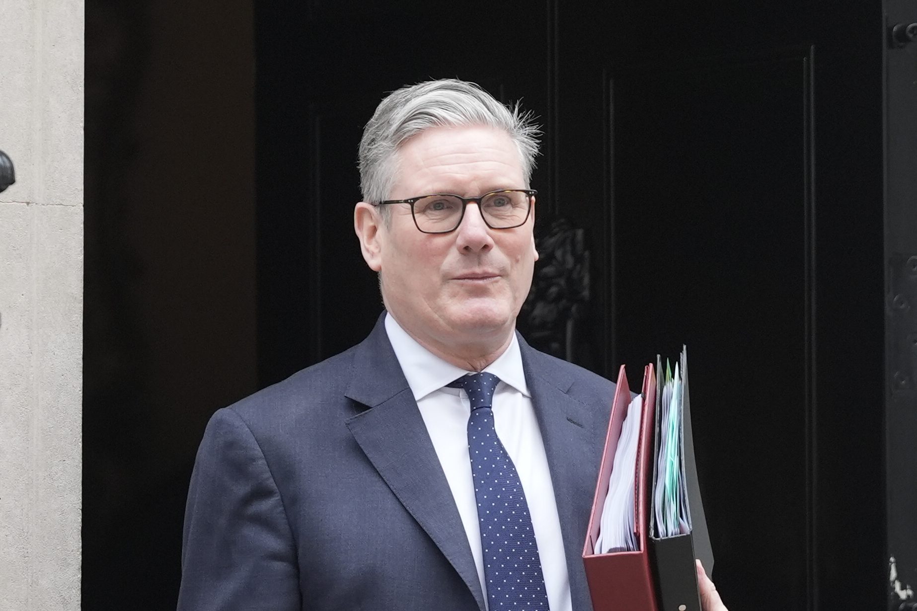 Starmer Deflects on Defence Investment Timeline Amid Tory Criticism