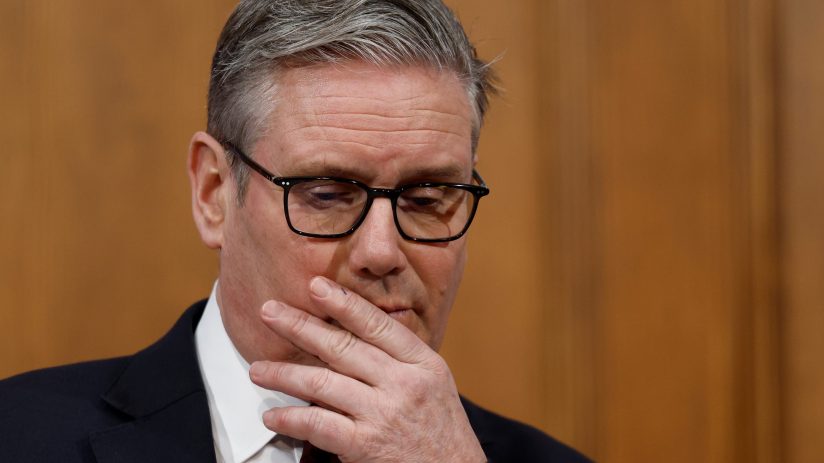 Keir Starmer outside Downing Street, engaging with media amidst significant political discussions