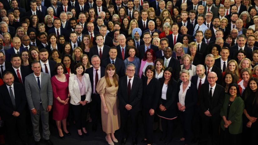 Labour MPs discussing policy changes during a parliamentary session, with expressions of focus and engagement in the chamber