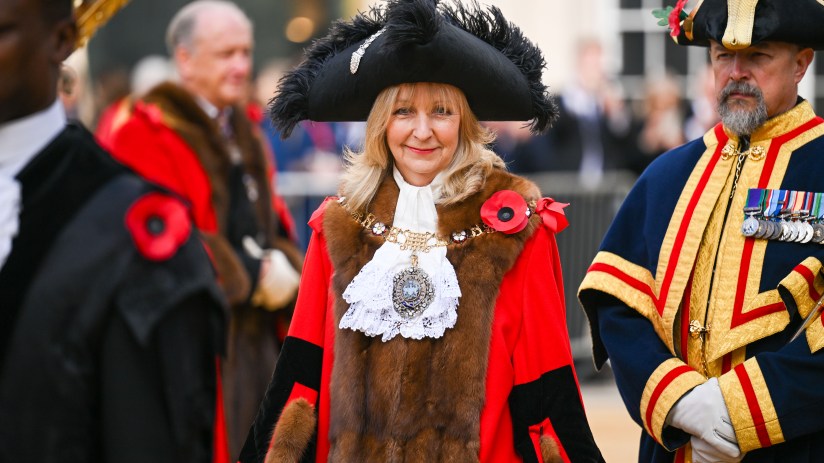 Lady Mayor Susan Langley at City of London event, wearing ceremonial attire, engaging with attendees, showcasing leadership.