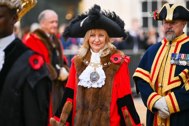 Lady Mayor Susan Langley at City of London event, wearing ceremonial attire, engaging with attendees, showcasing leadership.