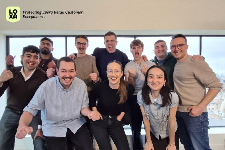 Loxa Team celebrating successful seed fundraise in their modern London office, fostering innovation and teamwork.