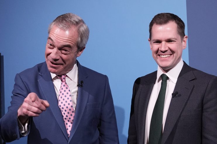 Nigel Farage and Robert Jenrick engaged in discussion at a public event, both in formal attire, highlighting political dis...