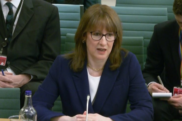 Rachel Reeves speaking at Treasury Committee meeting, highlighting key points on financial policies, dressed in business a...