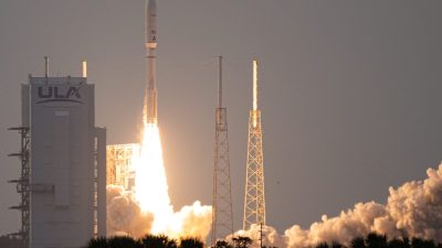 Satellite being launched into space against a twilight sky, showcasing cutting-edge technology and aerospace innovation