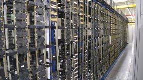Slough Network Operations Center interior with advanced equipment and personnel managing telecommunications systems