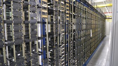 Slough Network Operations Center interior with advanced equipment and personnel managing telecommunications systems