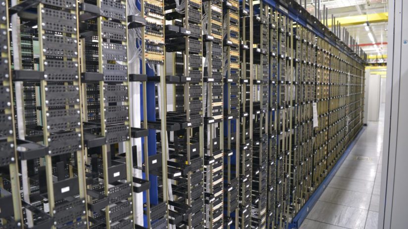 Slough Network Operations Center interior with advanced equipment and personnel managing telecommunications systems