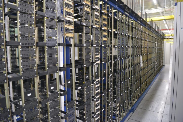 Slough Network Operations Center interior with advanced equipment and personnel managing telecommunications systems