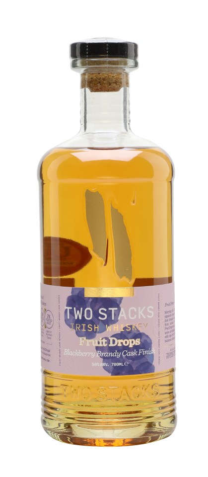 Two Stacks Blackberry Brandy Cask Finish whiskey bottles displayed with rich, dark labels in a stylish arrangement.