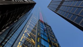 Skyline of City of London with iconic financial district buildings, highlighting UK investments and economic growth.